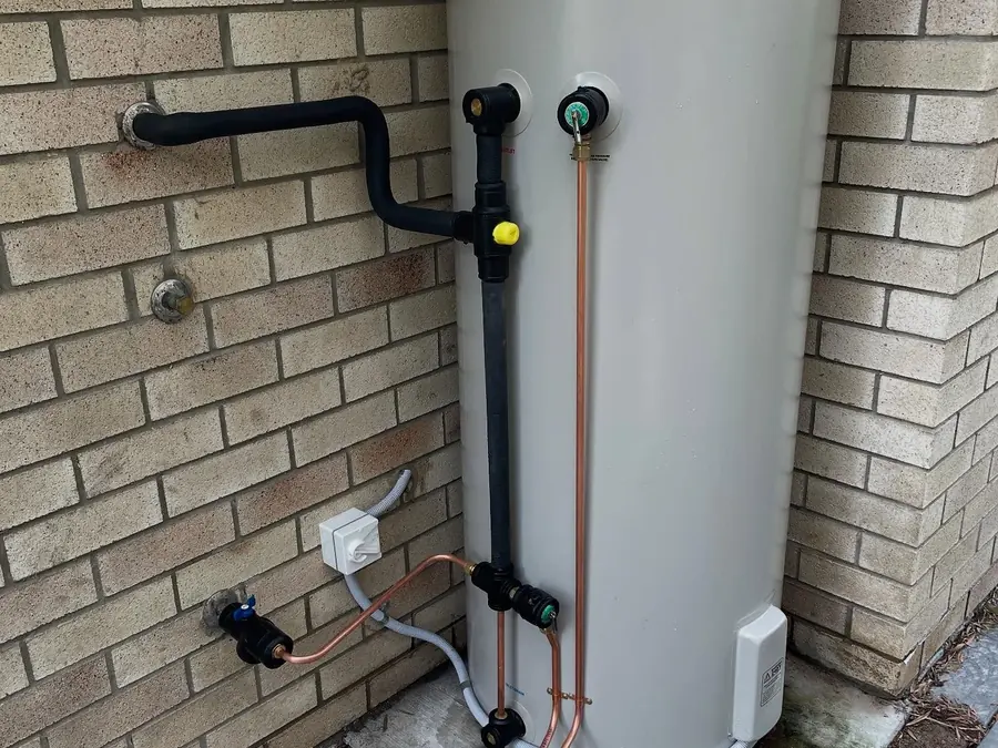 New Rinnai electric hot water system installed with new copper pipework and isolation valves