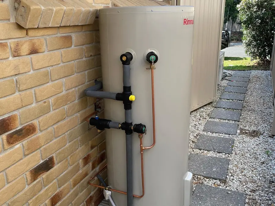 Larger new Rinnai hot water system installed with tidy lagged pipework